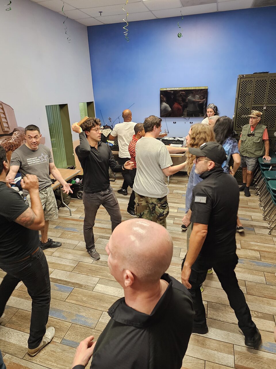 Participants engaged in a tactical training session indoors at 3B Tactical in Miami, FL