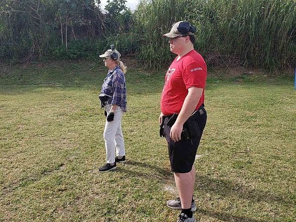 Two trainees preparing for firearms training at the outdoor range at 3B Tactical in Miami, FL