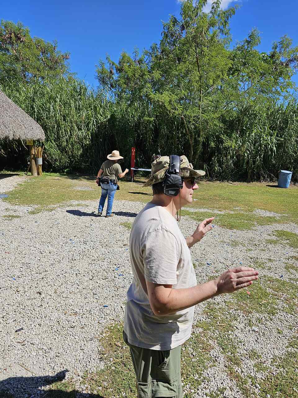 Trainees practicing shooting at targets during a training session at 3B Tactical in Miami, FL